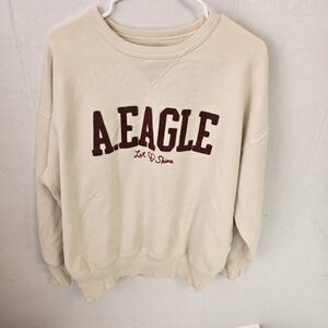 American Eagle Cream Sweatshirt Size XSmall Crew neck Boxy Let Love Shine U0436